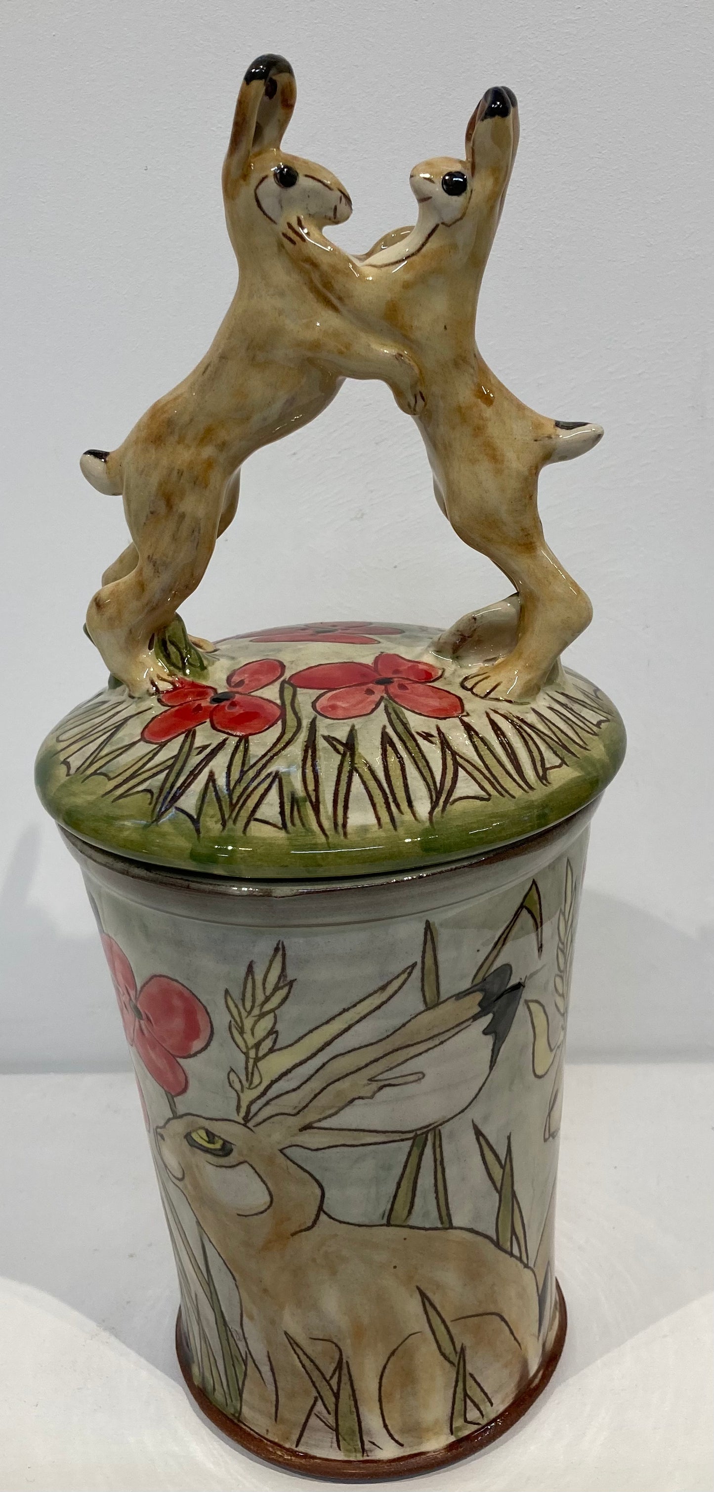 Large store jars depicting boxing hares
