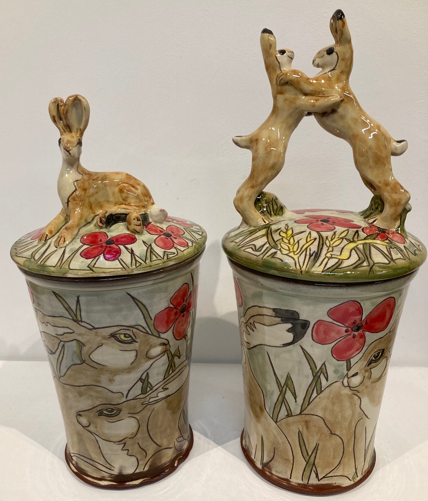 Large store jars depicting boxing hares